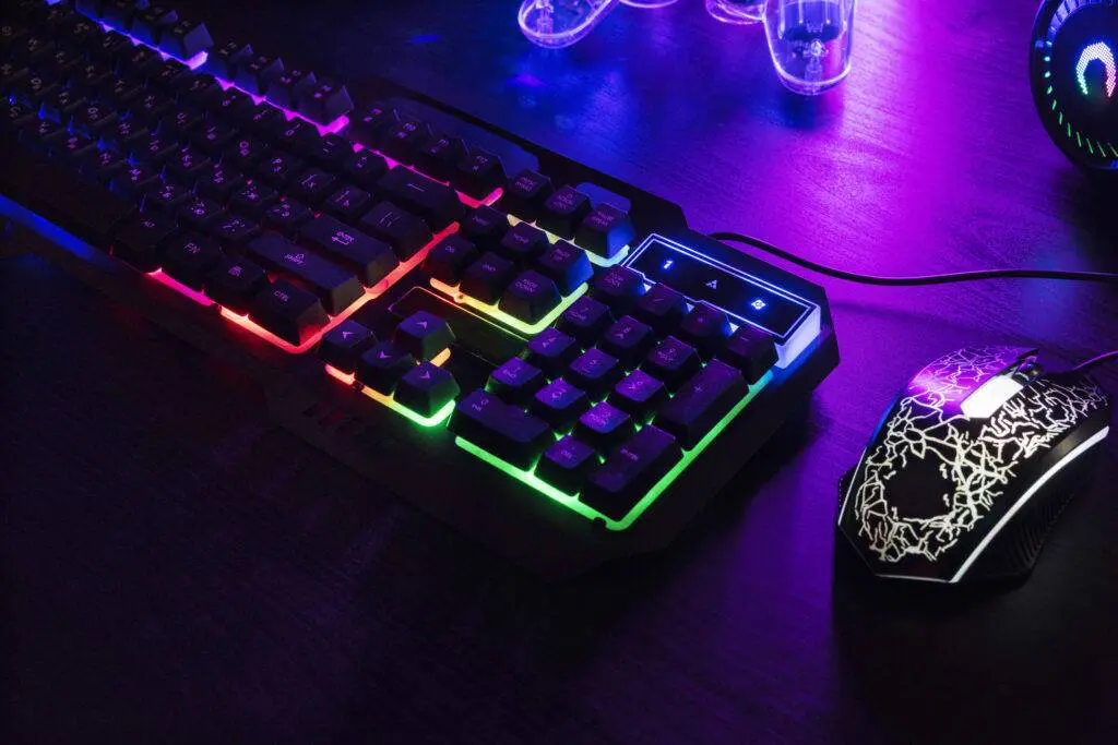 view-illuminated-neon-gaming-keyboard-setup-controller