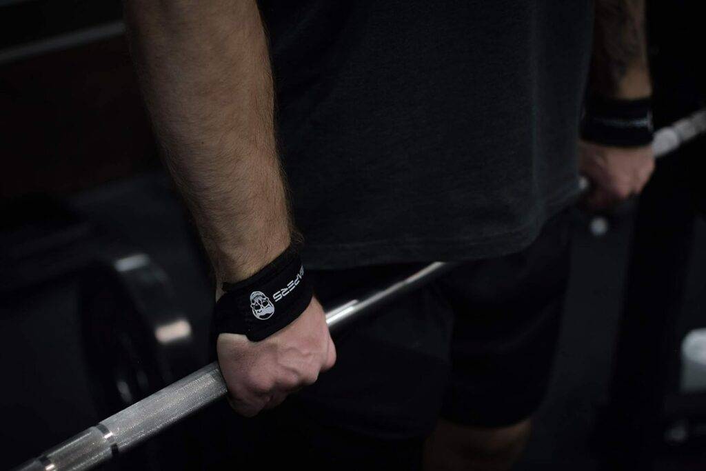 Holding a bar with Gymreapers Lifting Wrist 