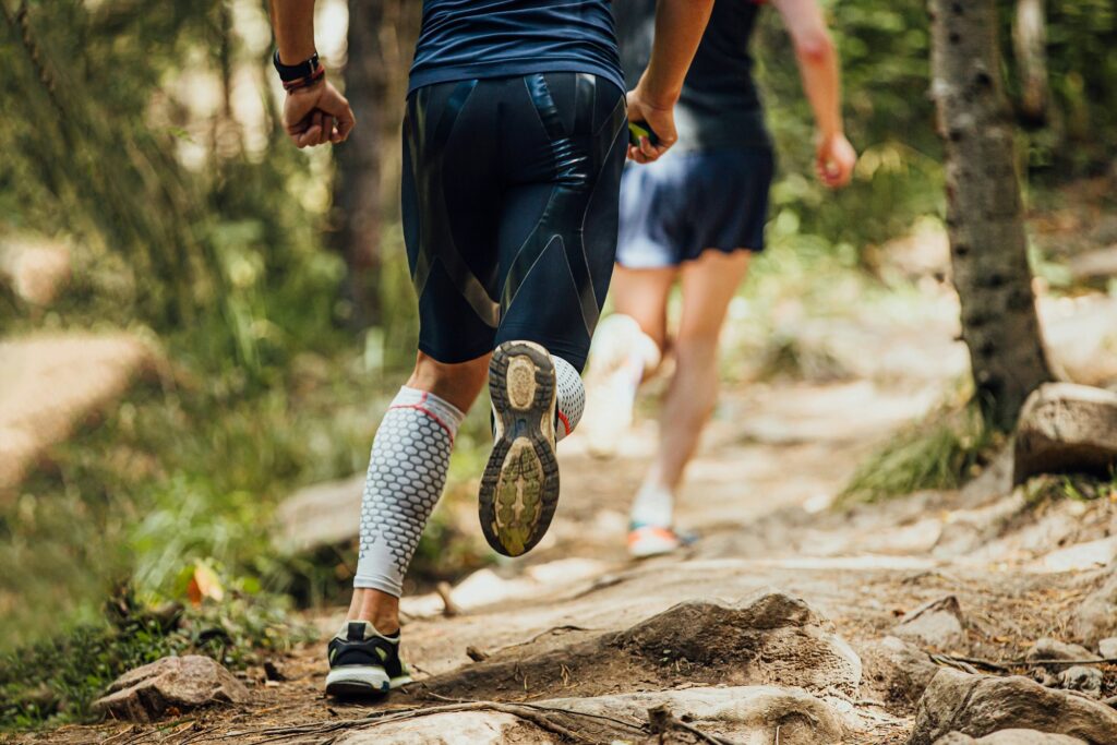 back man runner athlete run forest trail